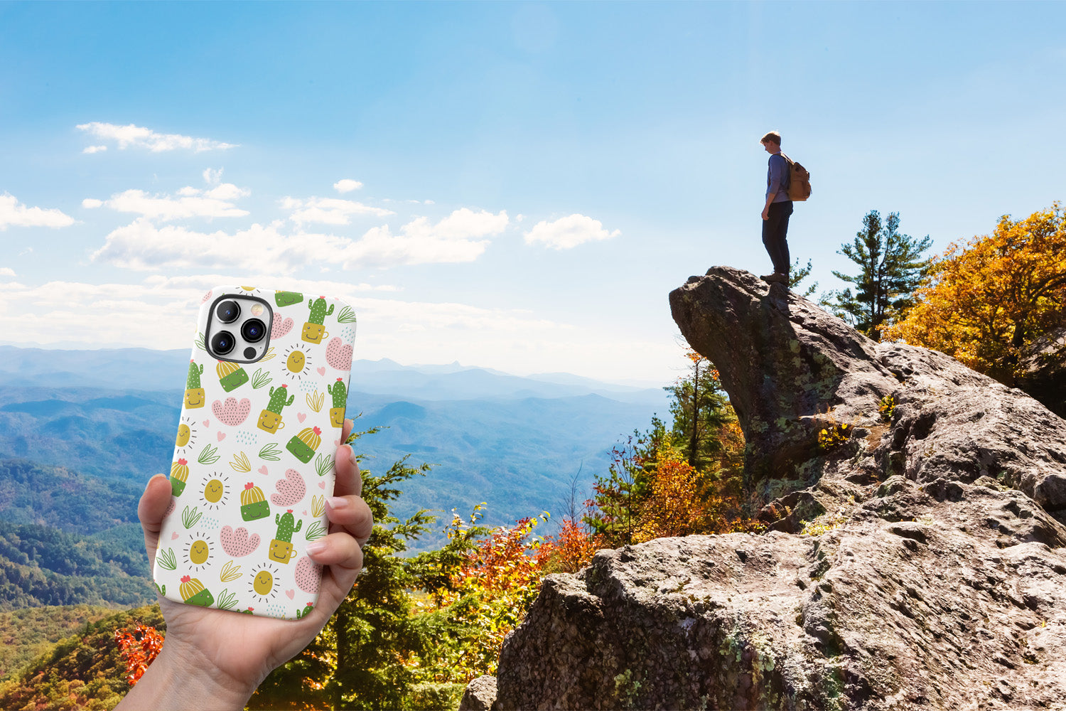 Hand holding an iPhone with Prickly Sunshine Cute Cactus Case on it outside in nature while a person with a backpack stands on a rock formation