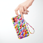 Eye Candy Evil Eye Phone Charm on a Rainbow Brick Roads Phone Case