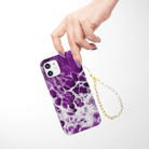 Golden Cascade Gold Coin Pearl Phone Charm on a Washed Up Phone Case